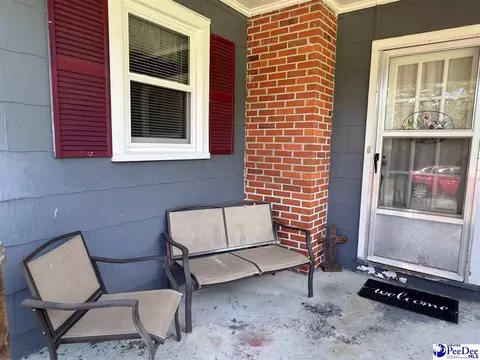 Exterior - 222 E Hampton St, Olanta, SC 29114 photo 3 of 5