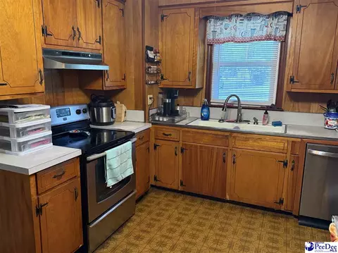 Kitchen - 222 E Hampton St, Olanta, SC 29114 photo 2 of 4