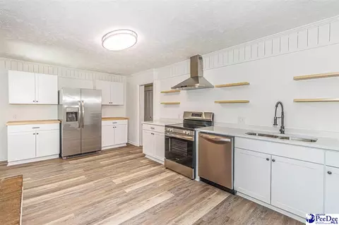 Kitchen - 302 Cleveland St, Mullins, SC 29574 photo 1 of 2