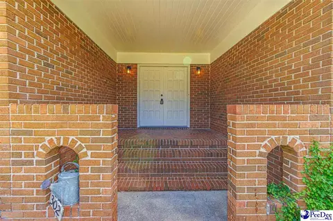 Exterior - 302 Cleveland St, Mullins, SC 29574 photo 2 of 12