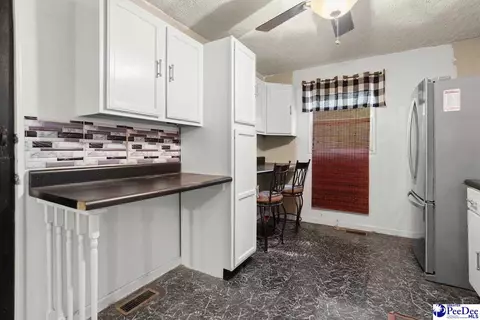 Kitchen - 73 E Cypress Ave, Mcbee, SC 29101 photo 1 of 3