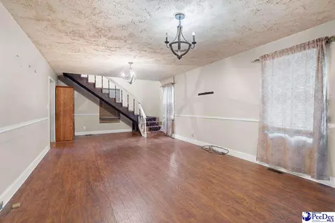 Living - 73 E Cypress Ave, Mcbee, SC 29101 photo 1 of 2