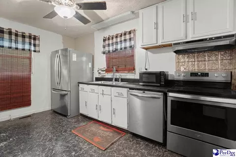 Kitchen - 73 E Cypress Ave, Mcbee, SC 29101 photo 3 of 3