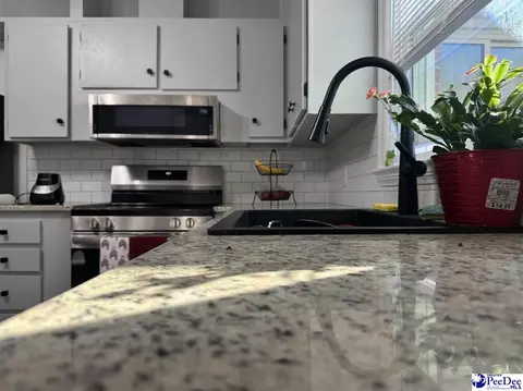 Kitchen - 1319 Richard St, Dillon, SC 29536 photo 1 of 2