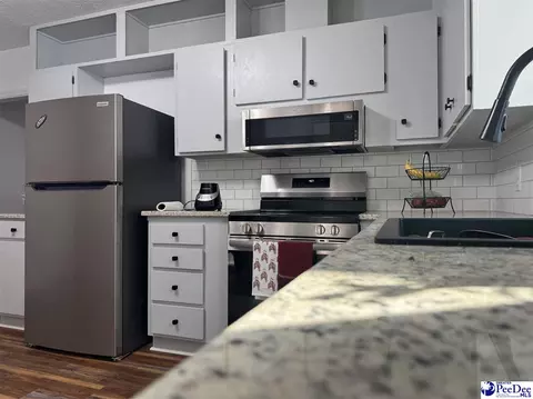Kitchen - 1319 Richard St, Dillon, SC 29536 photo 2 of 2
