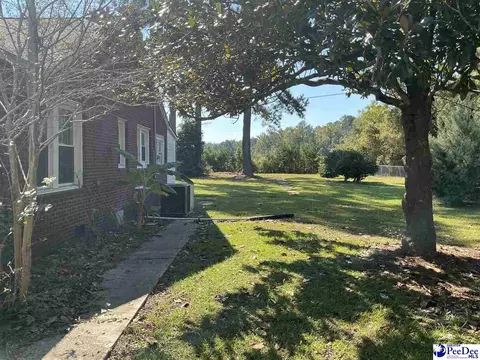 Exterior - 616 E Hampton St, Olanta, SC 29114 photo 5 of 11