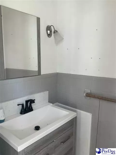 Bath - 616 E Hampton St, Olanta, SC 29114 photo 1 of 3