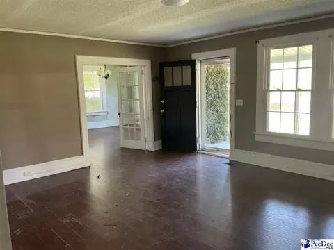 Living - 616 E Hampton St, Olanta, SC 29114 photo 2 of 2