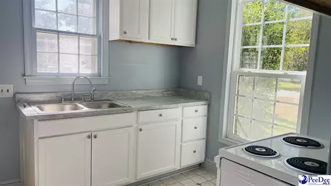 Kitchen - 214 Stewart St, Dillon, SC 29536 photo 1 of 3