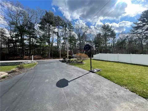 Exterior - 203 E Shore Dr, Coventry, RI 02816 photo 5 of 11