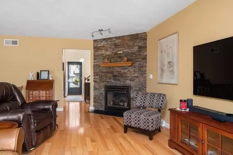 Living - 8 Shadowbrook Ln #E, Smithfield, RI 02917 photo 2 of 6