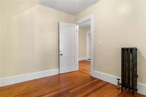 Bedroom - 58 Summer St, Woonsocket, RI 02895 photo 2 of 11