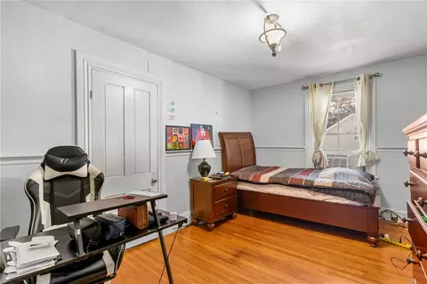 Bedroom - 58 Summer St, Woonsocket, RI 02895 photo 8 of 11