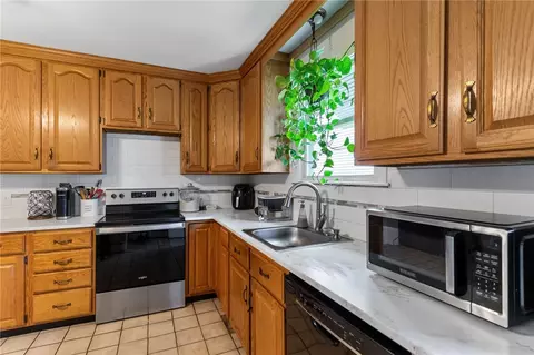 Kitchen - 65 Angell St, Woonsocket, RI 02895 photo 2 of 3