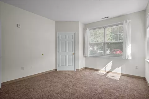 Bedroom - 114 Mill St #101, Woonsocket, RI 02895 photo 2 of 3