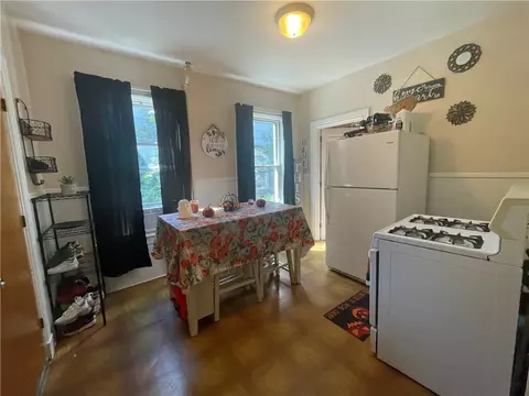 Kitchen - 409 Main St, Woonsocket, RI 02895 photo 2 of 6