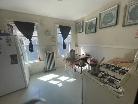 Kitchen - 409 Main St, Woonsocket, RI 02895 photo 4 of 6