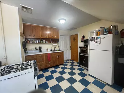 Kitchen - 409 Main St, Woonsocket, RI 02895 photo 5 of 6