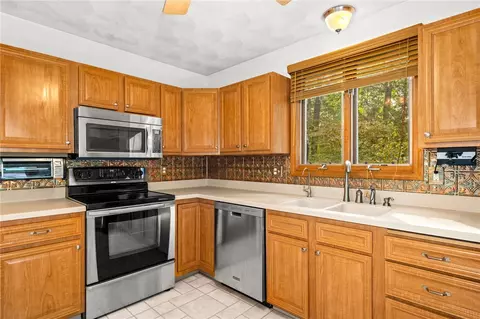 Kitchen - 335 Chaplin Dr, Coventry, RI 02816 photo 3 of 3