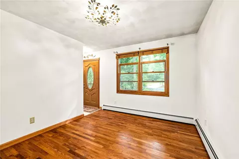Living - 335 Chaplin Dr, Coventry, RI 02816 photo 2 of 2