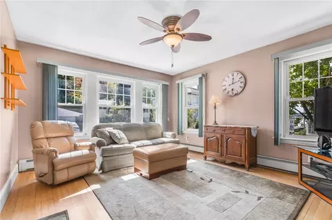 Living - 80 Cooper Ave, Woonsocket, RI 02895 photo 1 of 2