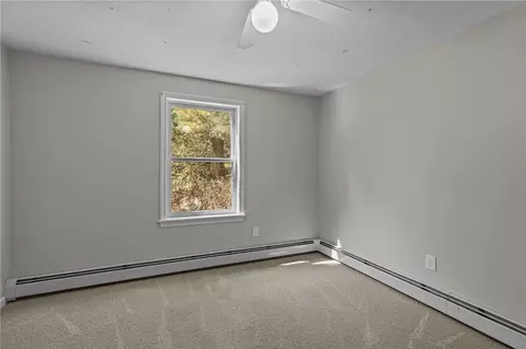 Bedroom - 3701 Post Rd, South Kingstown, RI 02879 photo 1 of 14