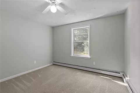 Bedroom - 3701 Post Rd, South Kingstown, RI 02879 photo 2 of 14