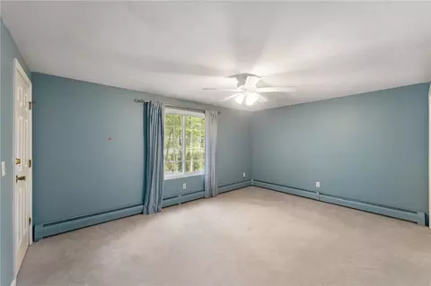 Bedroom - 31 Eagle Run #A, East Greenwich, RI 02818 photo 6 of 7