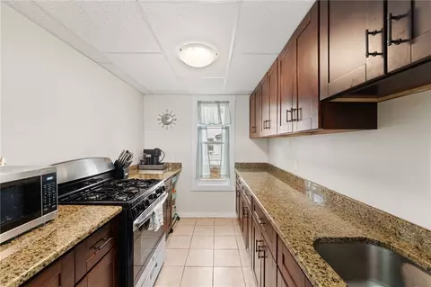 Kitchen - 460 Elm St, Woonsocket, RI 02895 photo 1 of 2