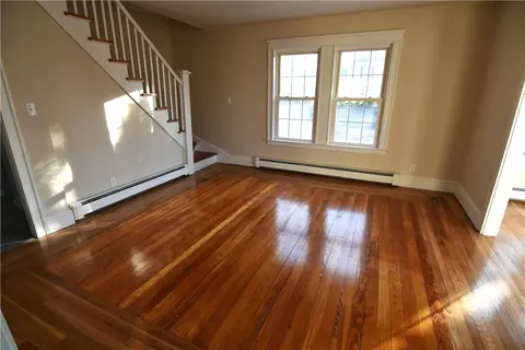 Living - 132 Division St, Woonsocket, RI 02895 photo 3 of 5