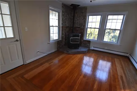 Living - 132 Division St, Woonsocket, RI 02895 photo 2 of 5