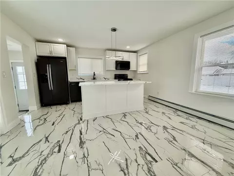 Kitchen - 215 Kenyon Ave, Pawtucket, RI 02861 photo 1 of 4