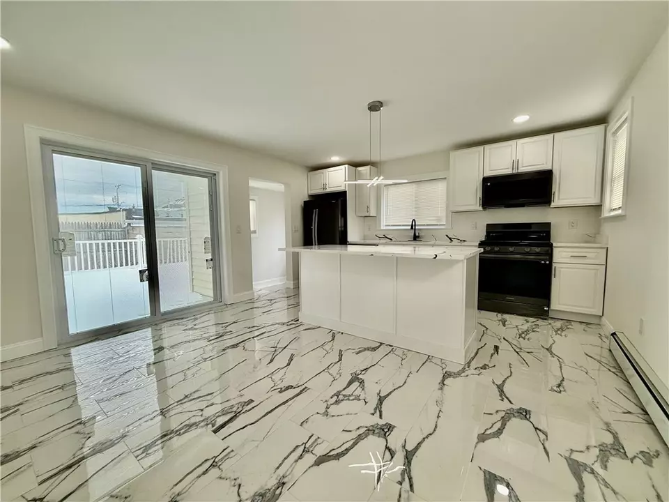Kitchen - 215 Kenyon Ave, Pawtucket, RI 02861 photo 3 of 4