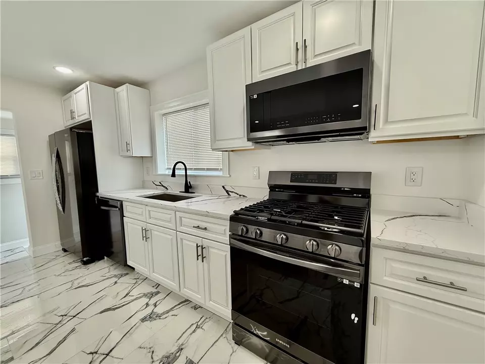 Kitchen - 215 Kenyon Ave, Pawtucket, RI 02861 photo 4 of 4