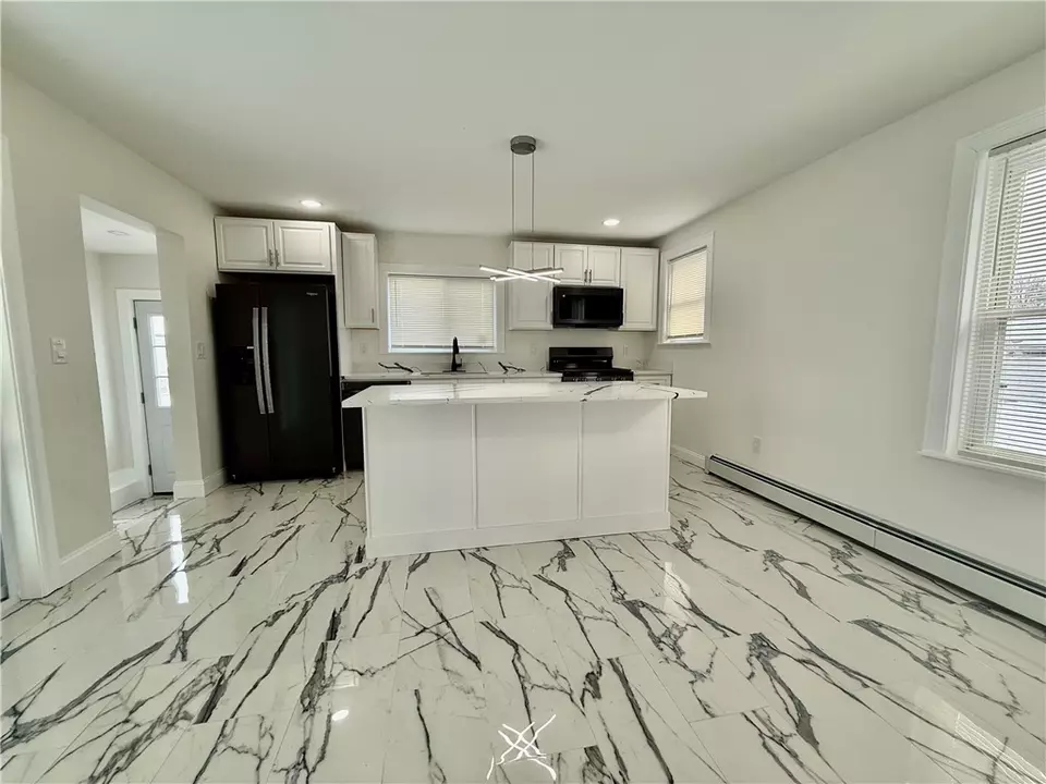 Kitchen - 215 Kenyon Ave, Pawtucket, RI 02861 photo 2 of 4