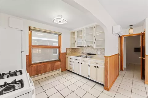 Kitchen - 49 Dean St, Woonsocket, RI 02895 photo 2 of 4
