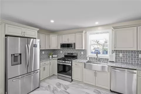 56 Center St, Woonsocket, RI 02895