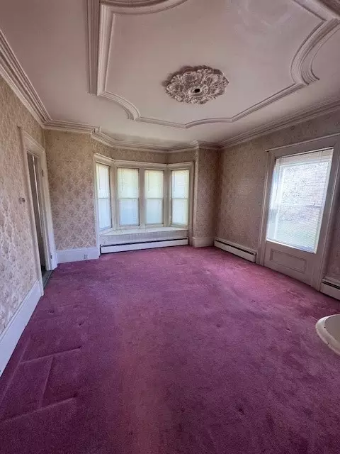 Living - 1207 Mendon Rd, Woonsocket, RI 02895 photo 4 of 4