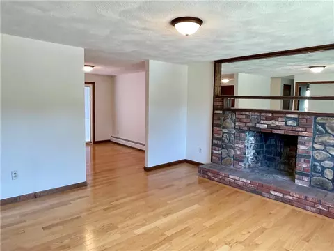 Living - 154 Aylsworth Ave, Woonsocket, RI 02895 photo 2 of 4