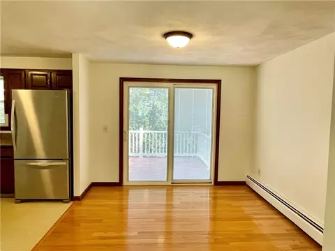 Living - 154 Aylsworth Ave, Woonsocket, RI 02895 photo 3 of 4