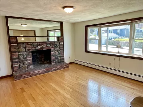 Living - 154 Aylsworth Ave, Woonsocket, RI 02895 photo 1 of 4
