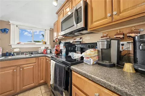 Kitchen - 79 Winthrop St, Woonsocket, RI 02895 photo 5 of 5