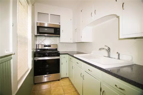 Kitchen - 563 Blackstone St, Woonsocket, RI 02895 photo 1 of 3