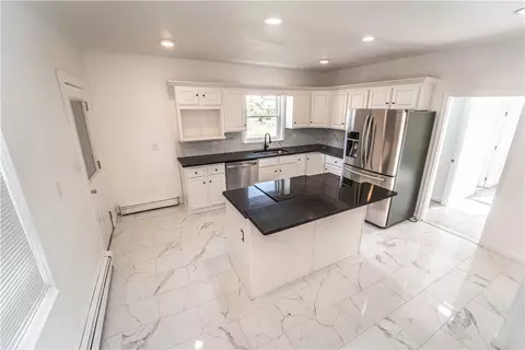 Kitchen - 132 Chestnut St, Woonsocket, RI 02895 photo 3 of 4
