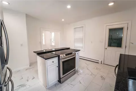 Kitchen - 132 Chestnut St, Woonsocket, RI 02895 photo 4 of 4