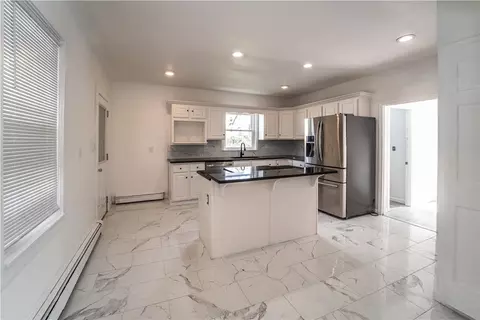 Kitchen - 132 Chestnut St, Woonsocket, RI 02895 photo 2 of 4