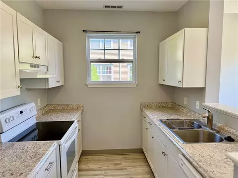 Kitchen - 106 Mill St #102, Woonsocket, RI 02895 photo 2 of 4
