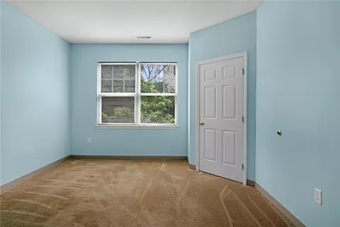 Bedroom - 120 Mill St #103, Woonsocket, RI 02895 photo 2 of 6
