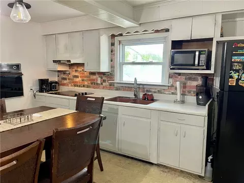 Kitchen - 15 Mill St, West Warwick, RI 02893 photo 2 of 2
