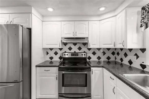 Kitchen - 54 Frontier Rd, Warwick, RI 02889 photo 2 of 2